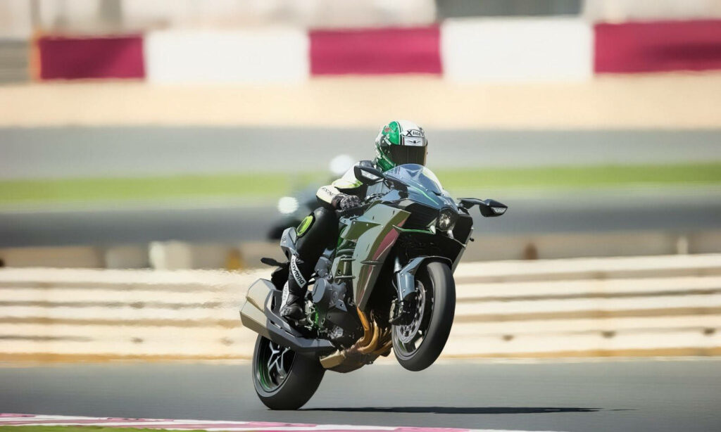 Adrenaline-Fueled Kawasaki H2R Wheelie Wallpaper Background