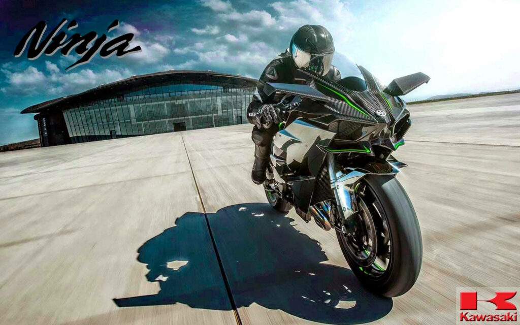 Dynamic Kawasaki Ninja H2R Rider Wallpaper - Futuristic Design