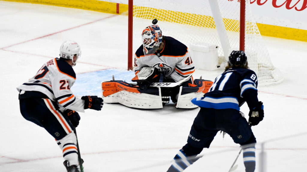 Intense Kyle Connor Wallpaper: Action-Packed Hockey vs. Oilers