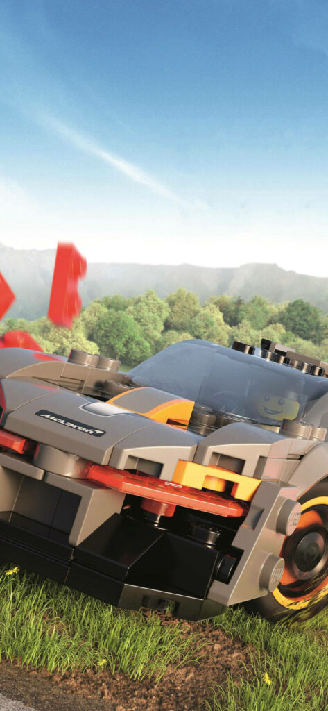 Dynamic LEGO McLaren Car Wallpaper with Vibrant Nature Background
