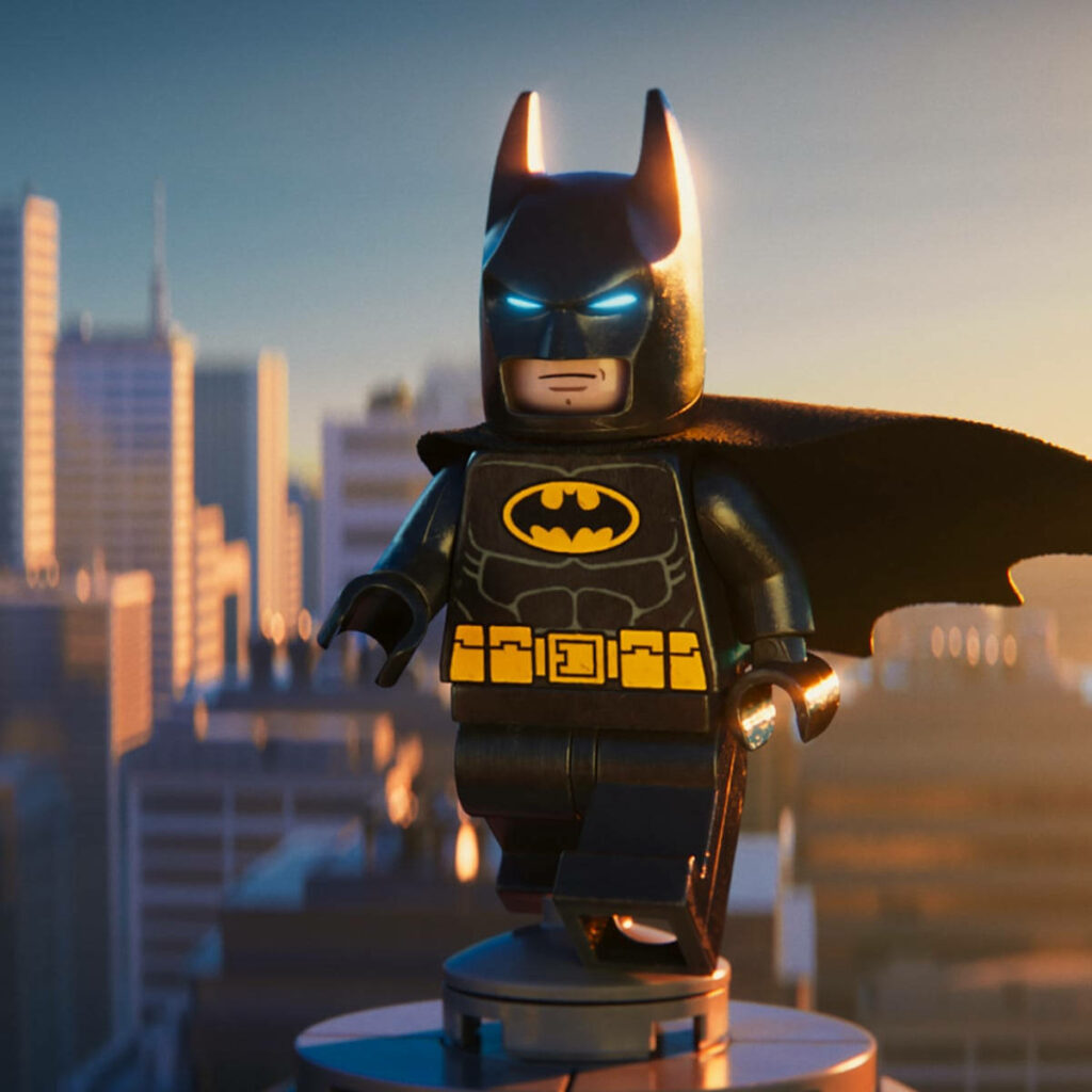 Dynamic Lego Batman Wallpaper: Iconic Hero at Sunset Cityscape