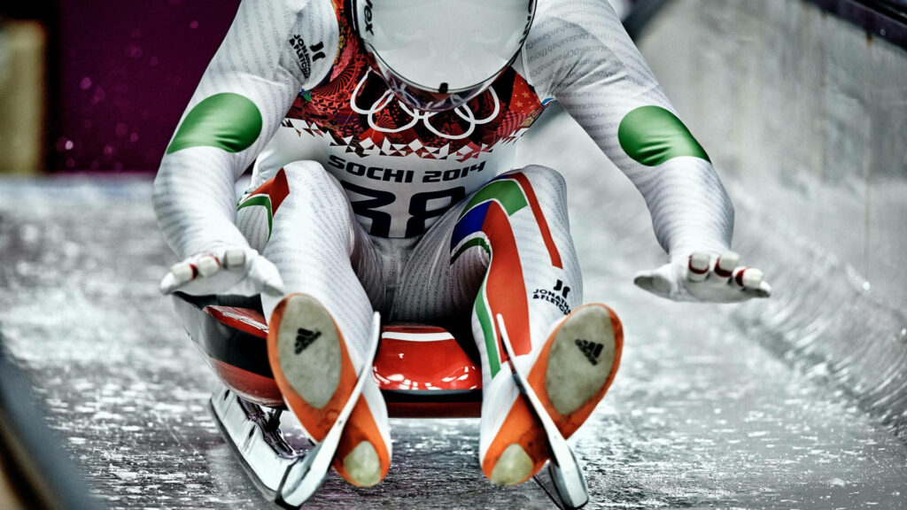 Dynamic Luge Competitor Wallpaper from 2014 Sochi Winter Olympics