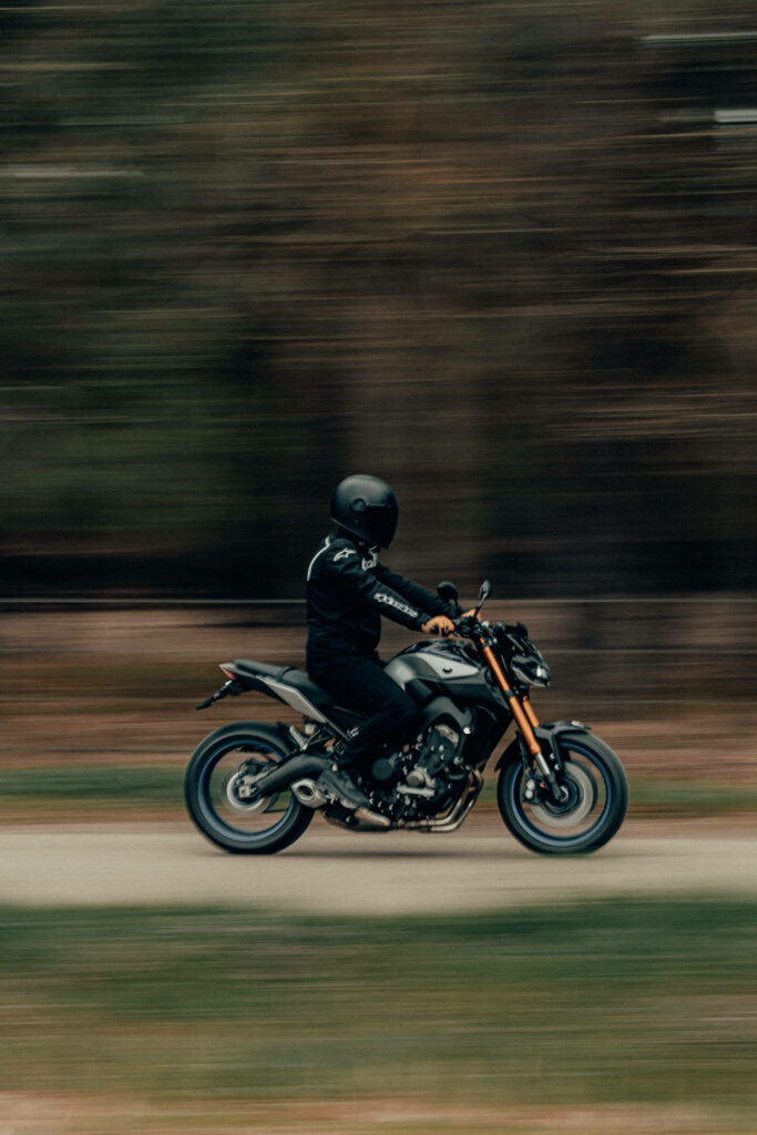 Dynamic Matte Black Motorcycle Wallpaper – Speed & Adventure Vibes