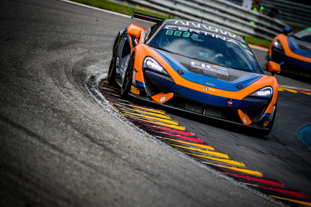 Dynamic McLaren Sports Car Racing Wallpaper | High-Res Background