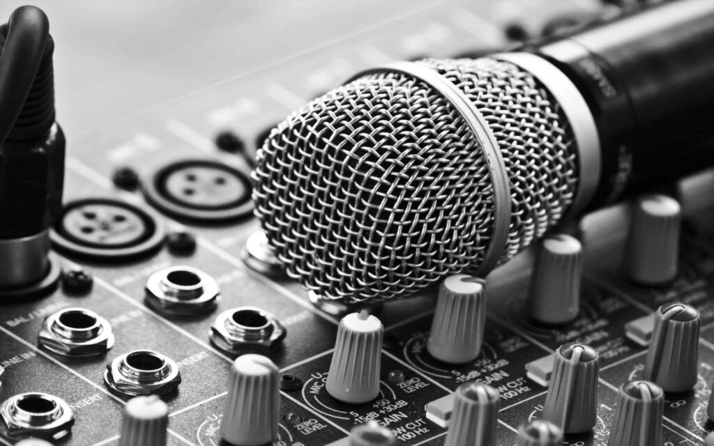 Dynamic Microphone & Mixing Console: Black & White Audio Wallpaper