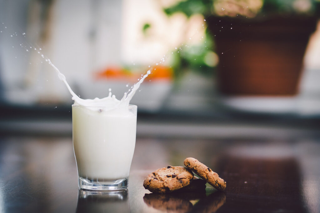 Dynamic Milk Splash Wallpaper with Cookies - Soft Natural Background