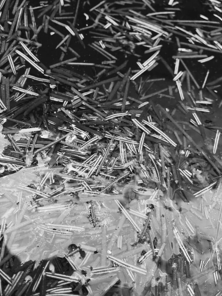 Captivating Monochrome Wallpaper with Floating Sticks and Texture