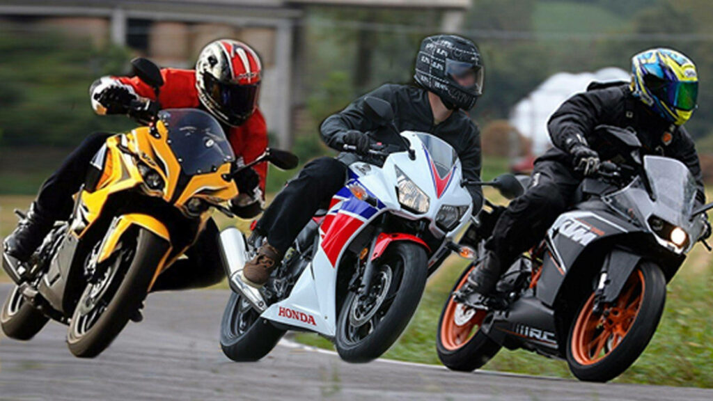 Dynamic Motorcycle Race Wallpaper - Powerful Bikes in Action