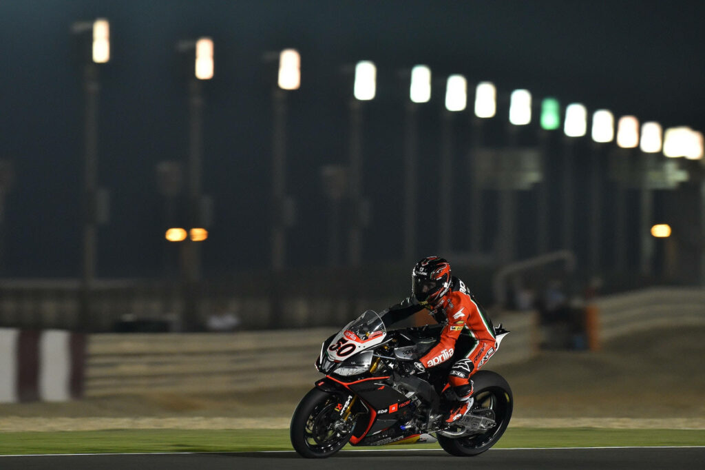 Thrilling Motorcycle Racer Wallpaper: Speed and Adrenaline Under Lights