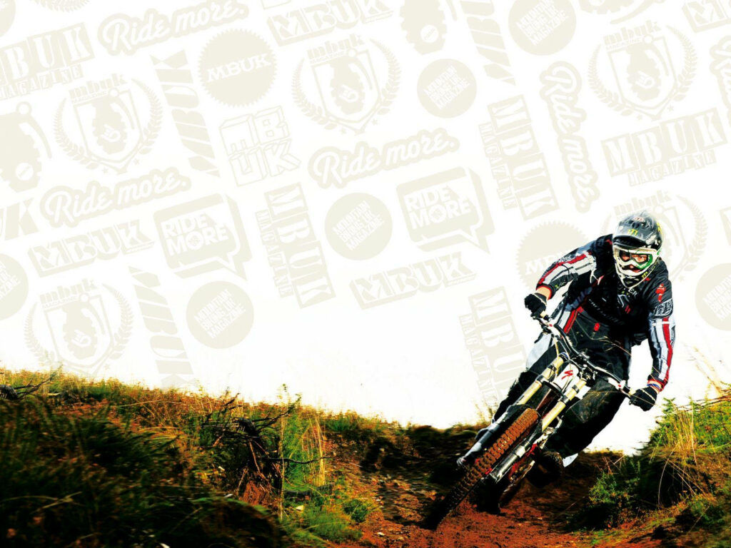 Dynamic Mountain Biker Wallpaper: Action-Packed Urban Trail Scene