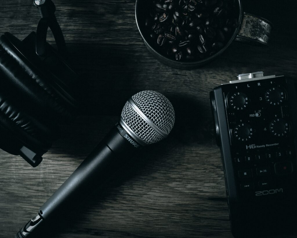 Moody Music Wallpaper: Microphone & Headphones on Wood Surface