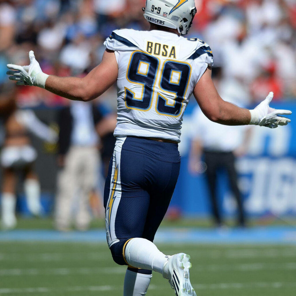 Dynamic NFL Wallpaper of Joey Bosa in Game Uniform - Jersey 99
