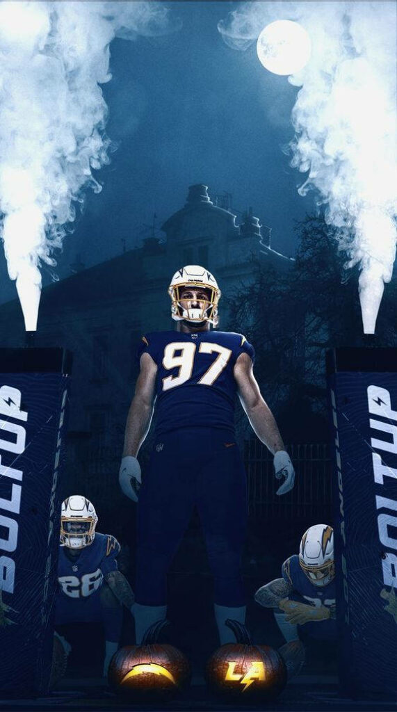 Joey Bosa NFL Game Entrance Wallpaper: Dramatic Nighttime Background
