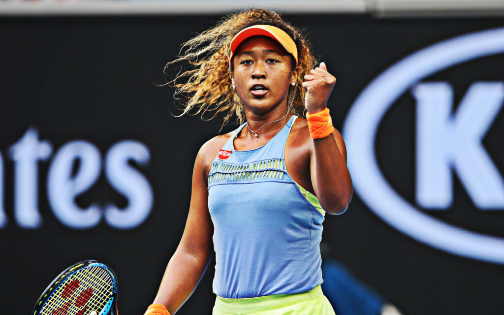 Naomi Osaka's Dynamic Fist Pump: Tennis Passion Wallpaper Background