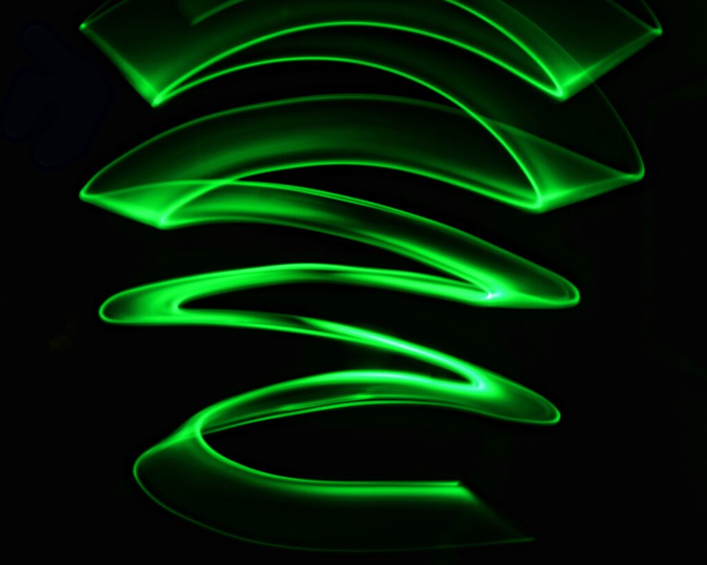 Modern Neon Green Wavy Zigzag Wallpaper on Dark Background