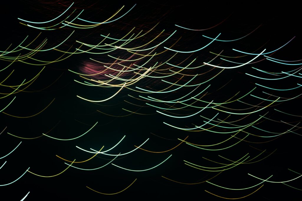 Futuristic Neon Stripes Wallpaper on Black Background