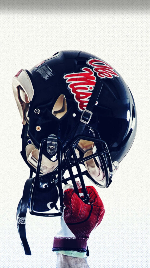Dynamic Ole Miss Football Wallpaper: Player & Helmet Team Pride