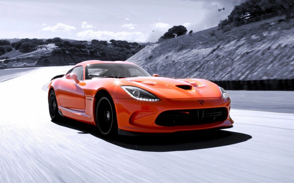 Dynamic Orange Dodge Viper Wallpaper - Speed & Scenic Background