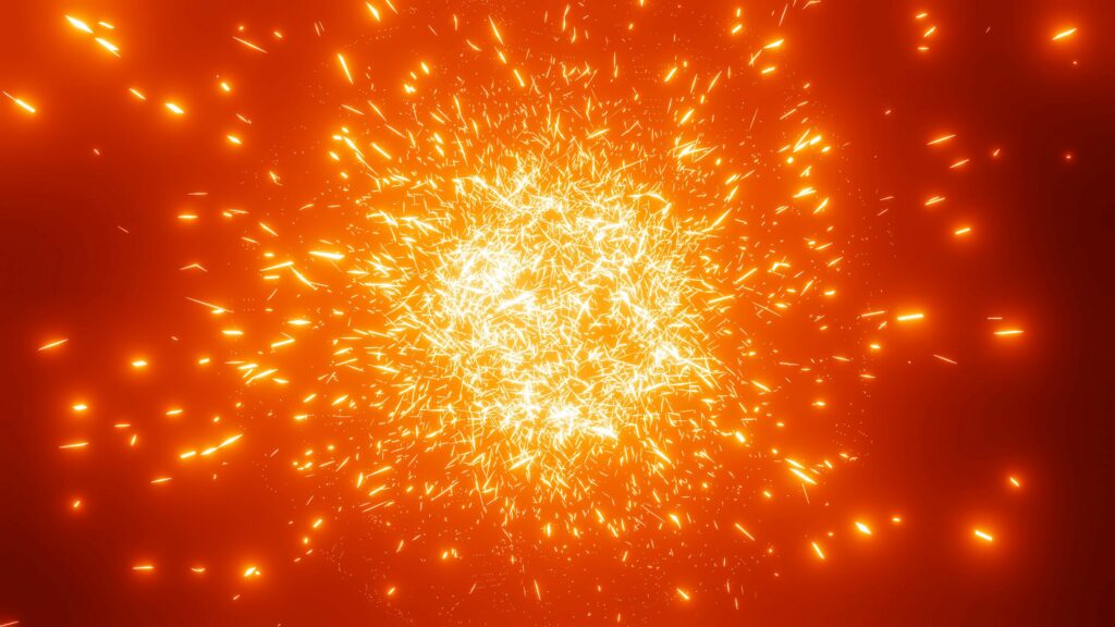 Vibrant Explosion of Sparks on Fiery Orange Background Wallpaper