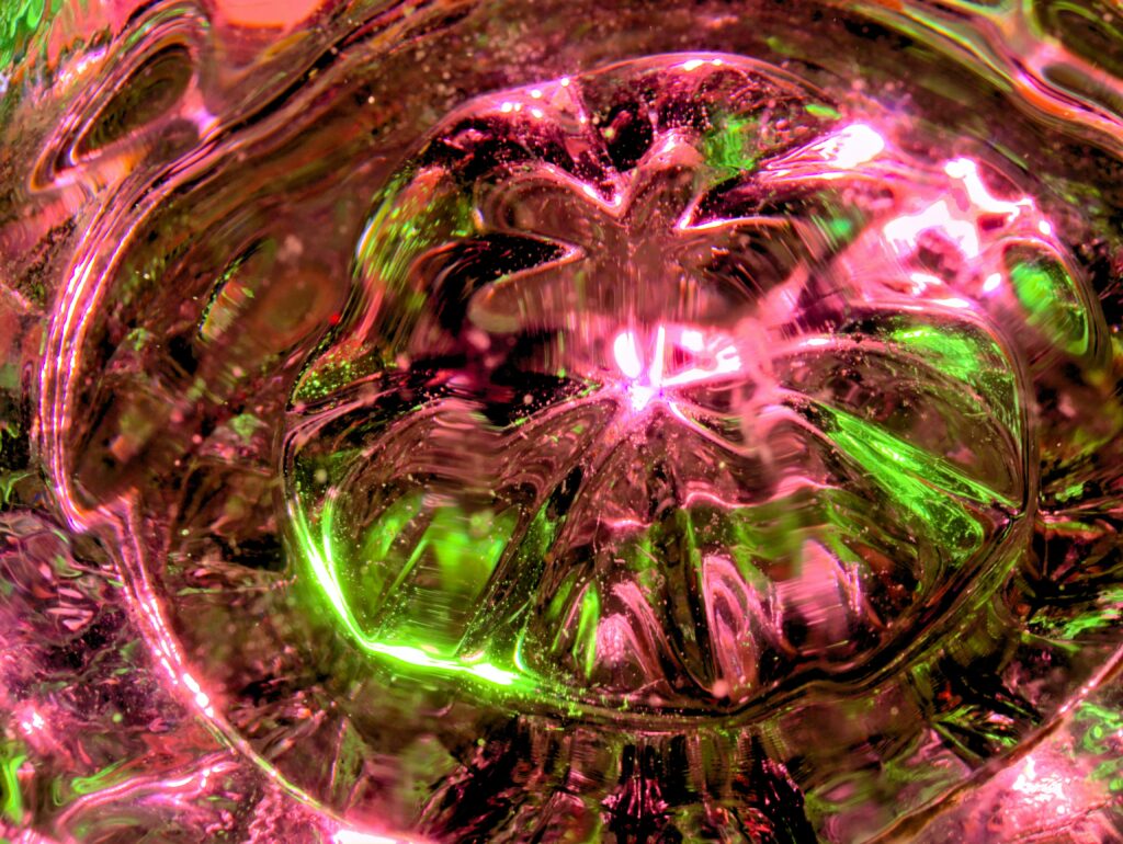 Dynamic Pink & Green Abstract Wallpaper with Reflective Surface