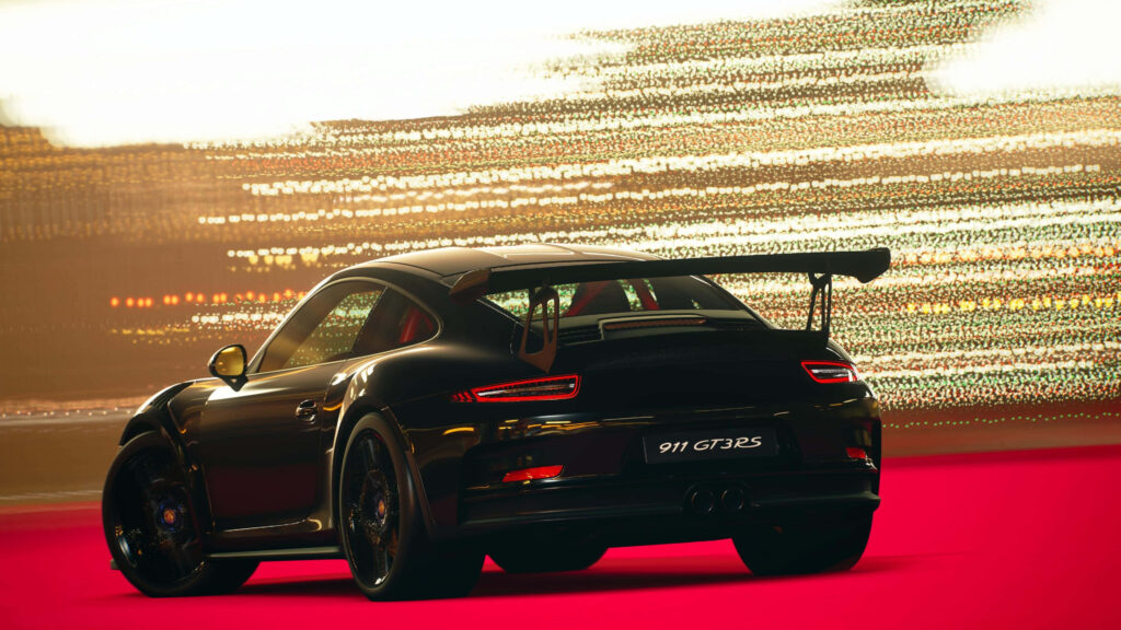 Sporty Porsche 911 GT3 RS Wallpaper with Dynamic Background