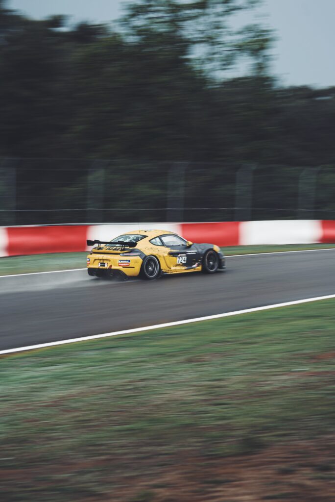Porsche Cayman GT4 Racing Wallpaper: Dynamic Speed & Performance