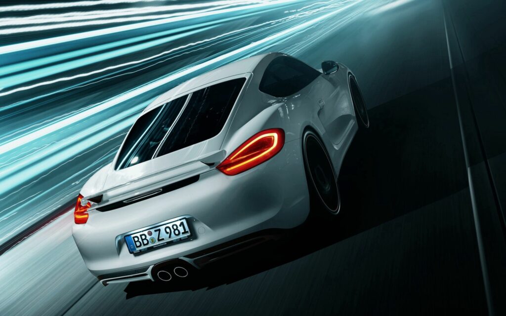 Dynamic Porsche Cayman Wallpaper: Speed & Style in Motion