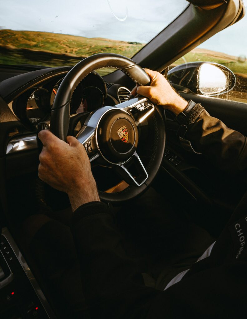 Dynamic Porsche Interior: Luxury Driving Experience Wallpaper