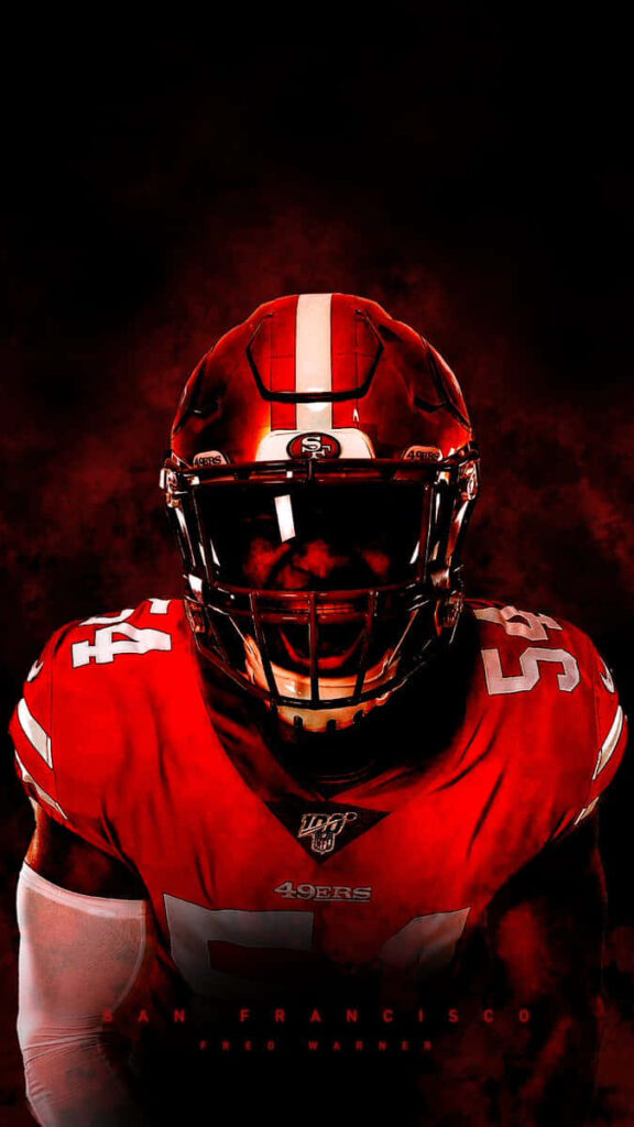 Intense Red 49ers Wallpaper: Fred Warner Exuding Strength