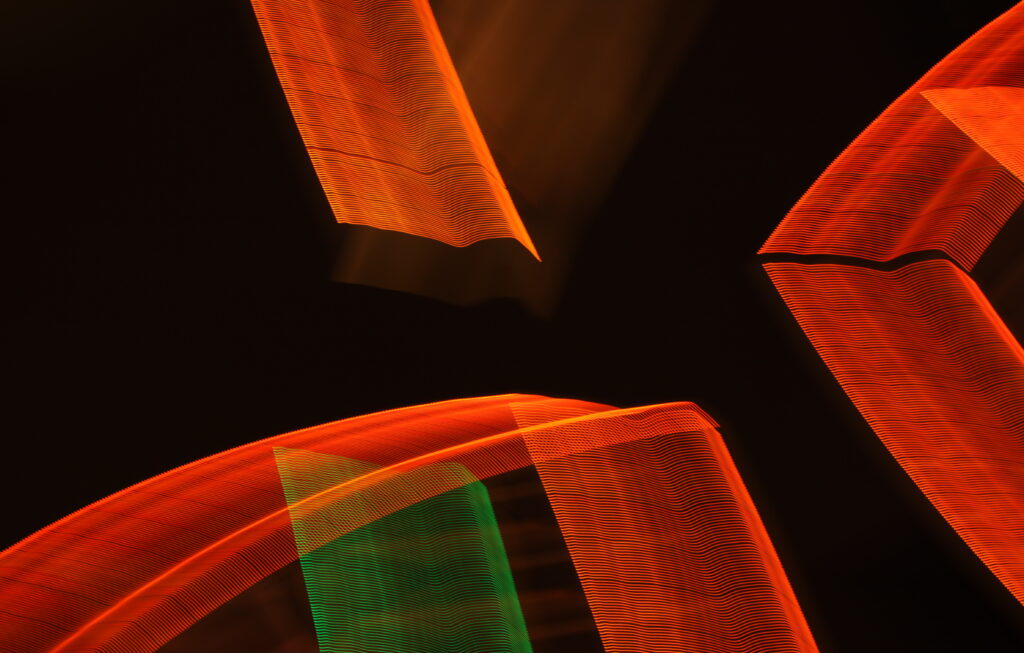 Dynamic Red Lines on Dark Background - Energetic Abstract Wallpaper