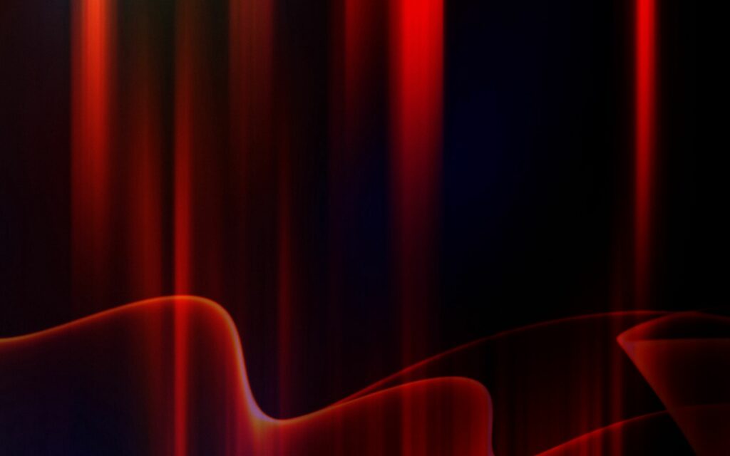 Dynamic Abstract Wallpaper: Flowing Red & Orange Lines on Dark Background