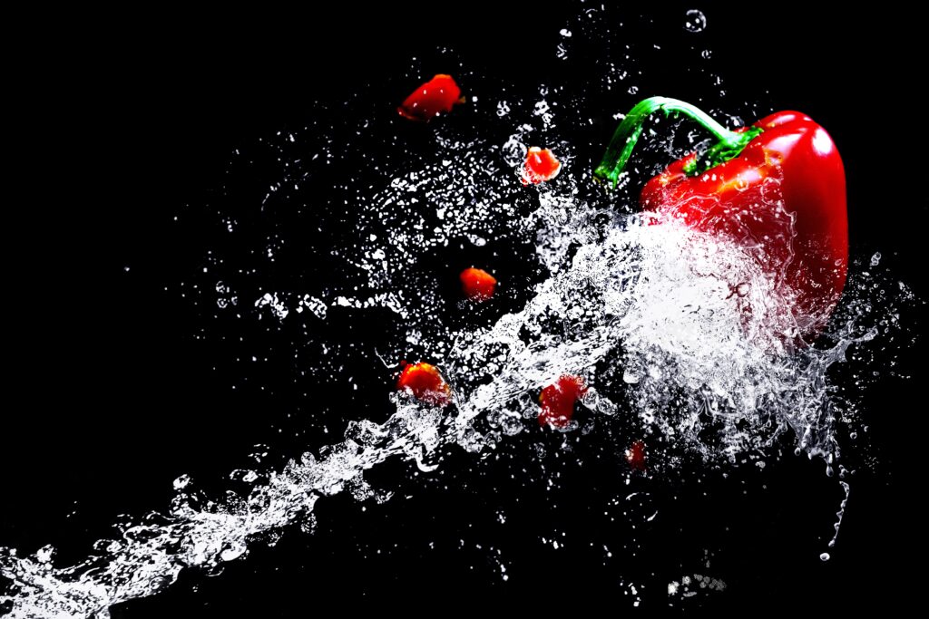 Vibrant Red Pepper Splash: Dynamic Wallpaper Background