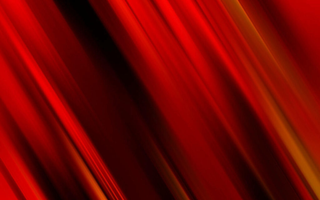Vibrant Velocity: Exploring the Dynamic Power of Red in Abstract Art Wallpaper