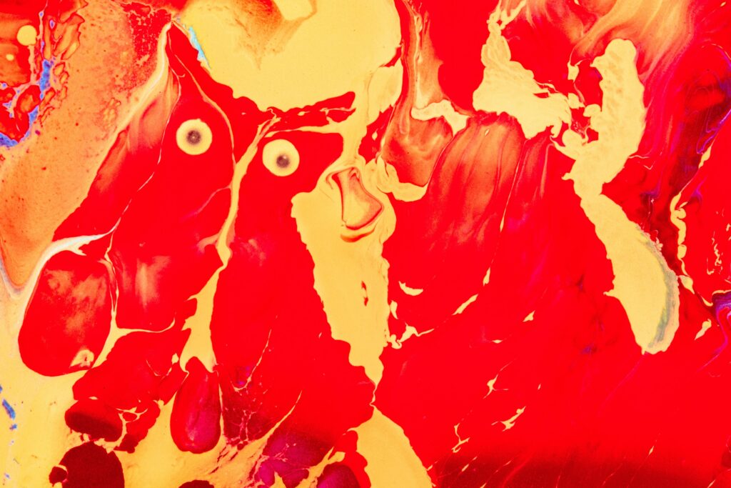 Dynamic Red & Yellow Fluid Art Wallpaper - Bold Abstract Background