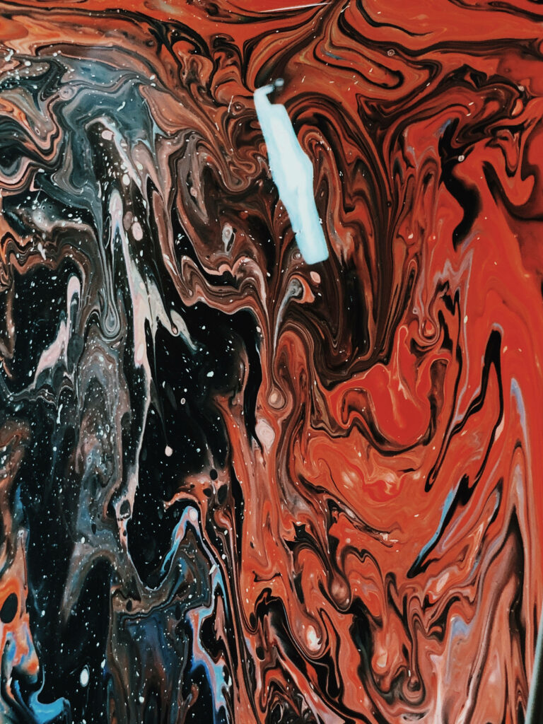 Dynamic Red and Black Abstract Wallpaper: Cosmic Marble Background