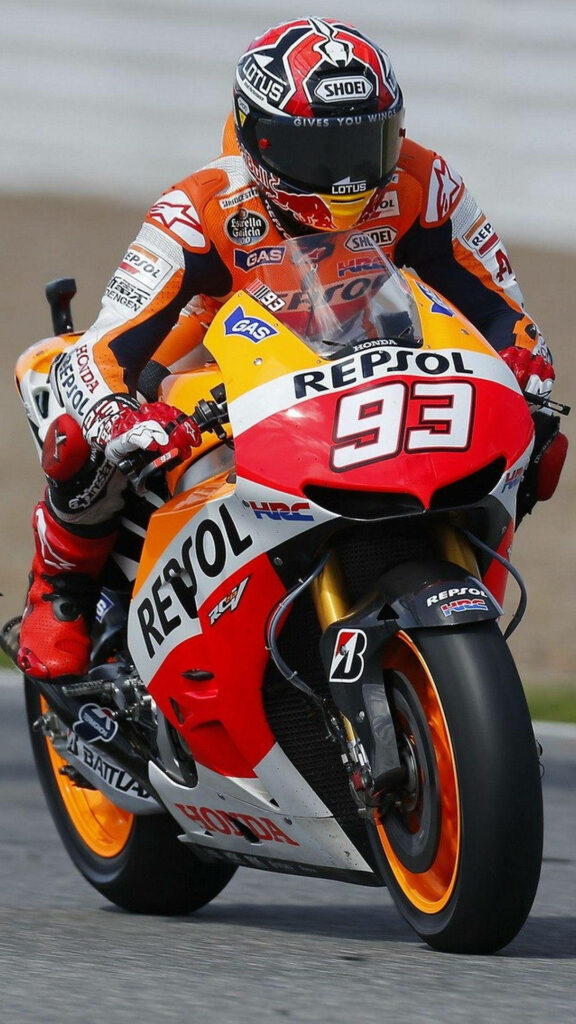 Dynamic Repsol Team Bike Wallpaper: MotoGP Action for Motorsport Fans
