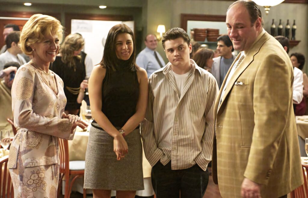 Vibrant 'The Sopranos' Restaurant Scene - Dynamic Cast Wallpaper