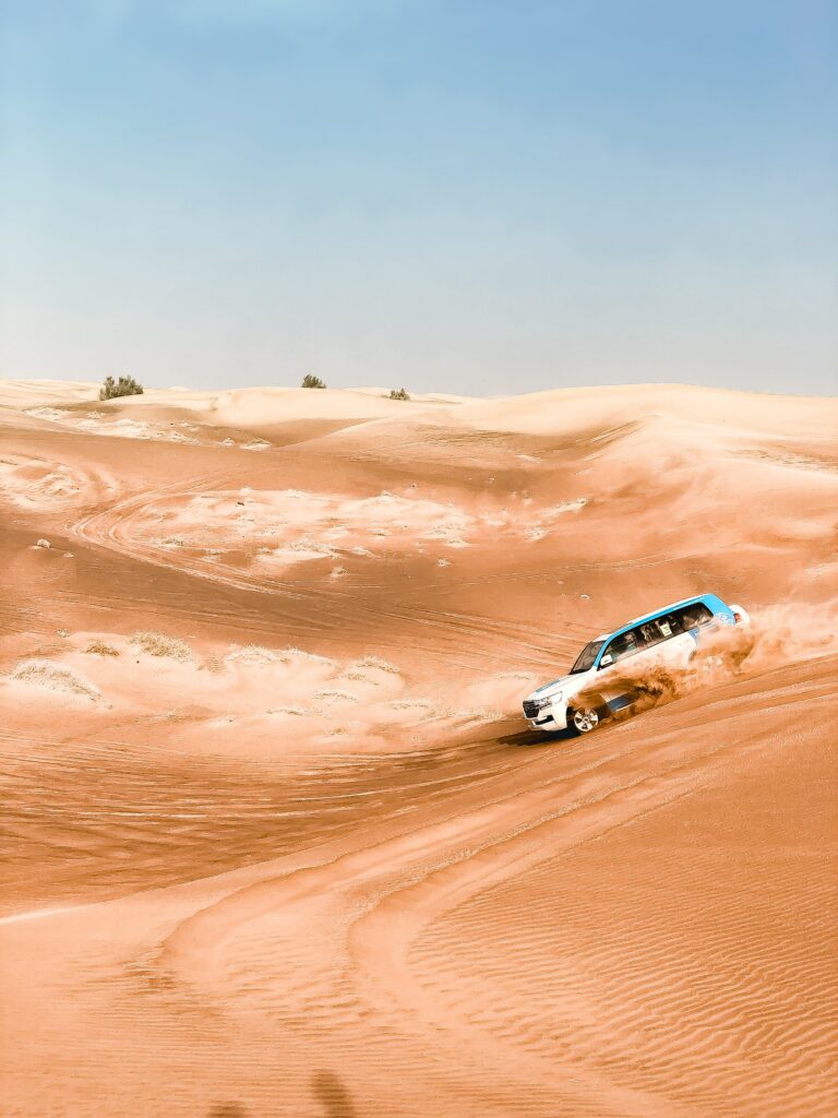Adventure SUV in Desert: Dynamic Wallpaper of Dune Exploration