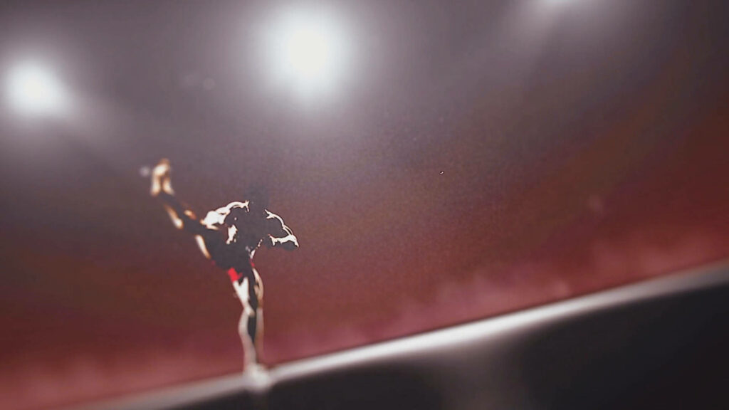 Dynamic Shadows: Baki Hanma Strikes a Powerful Pose in Spotlight Wallpaper