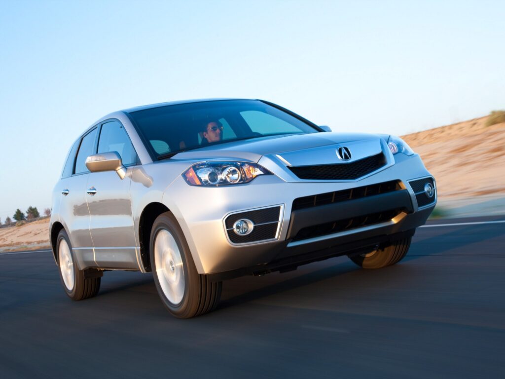 Speeding Silver Acura RDX: Striking Front View Wallpaper