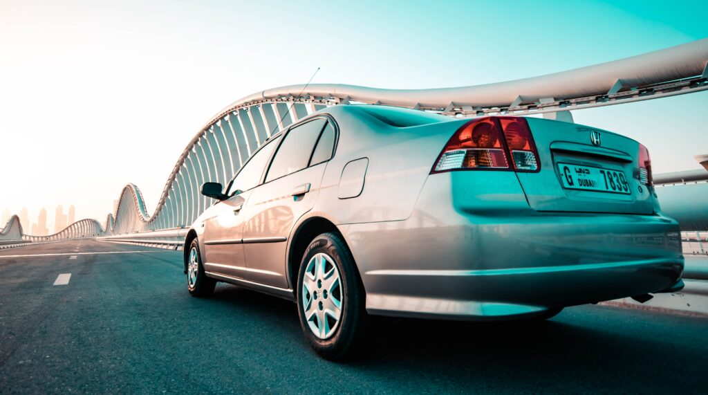 Dynamic Silver Honda Civic Wallpaper on Urban Bridge
