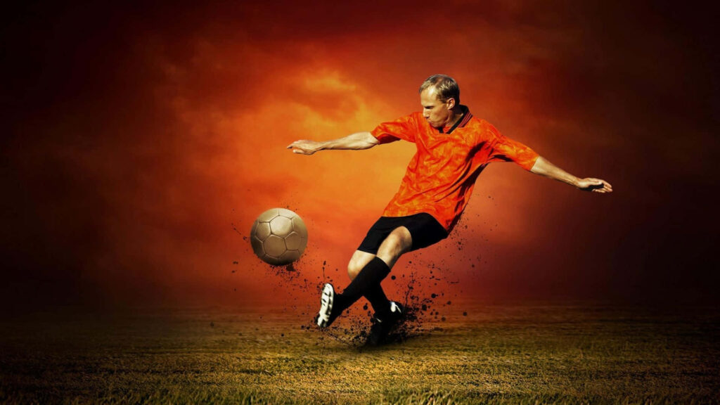 Dynamic Soccer Player Wallpaper: Energy & Passion in Fiery Background
