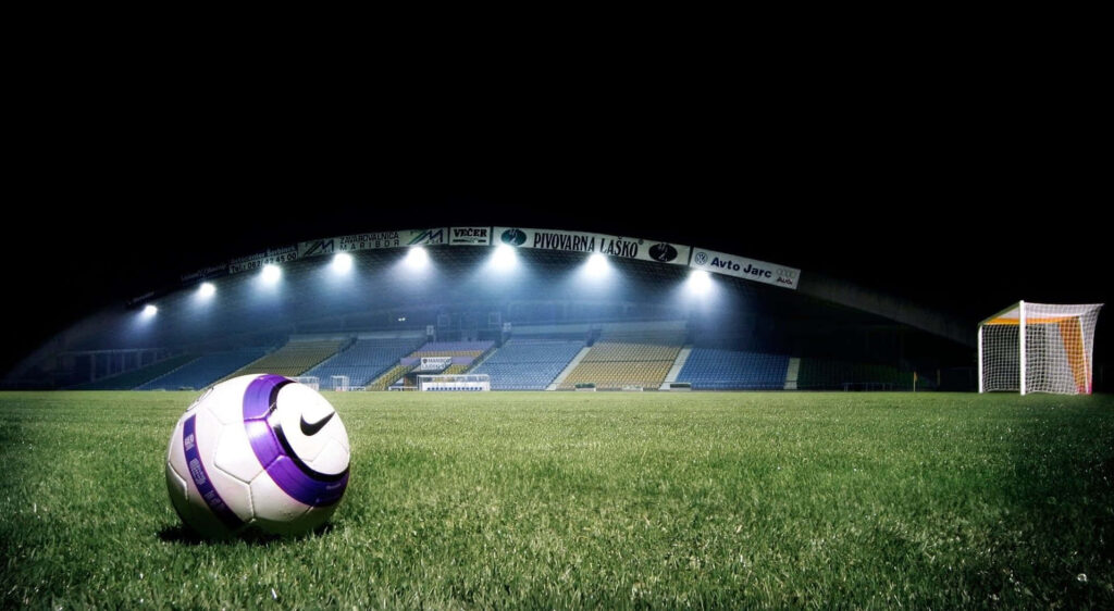 Dynamic Soccer Scene Wallpaper: Intense Stadium Atmosphere
