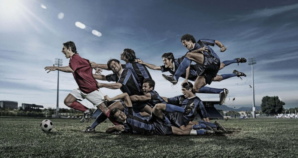 Thrilling Soccer Action: Dynamic Wallpaper of Player Breaking Free