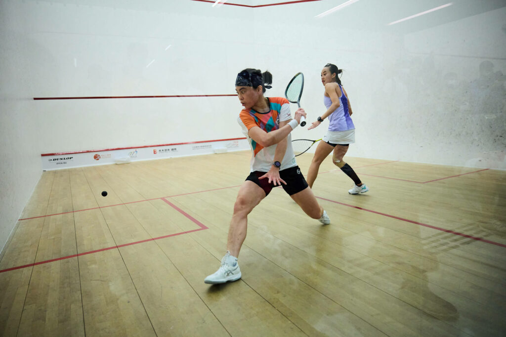 Intense Squash Players Wallpaper - Modern White Court Background