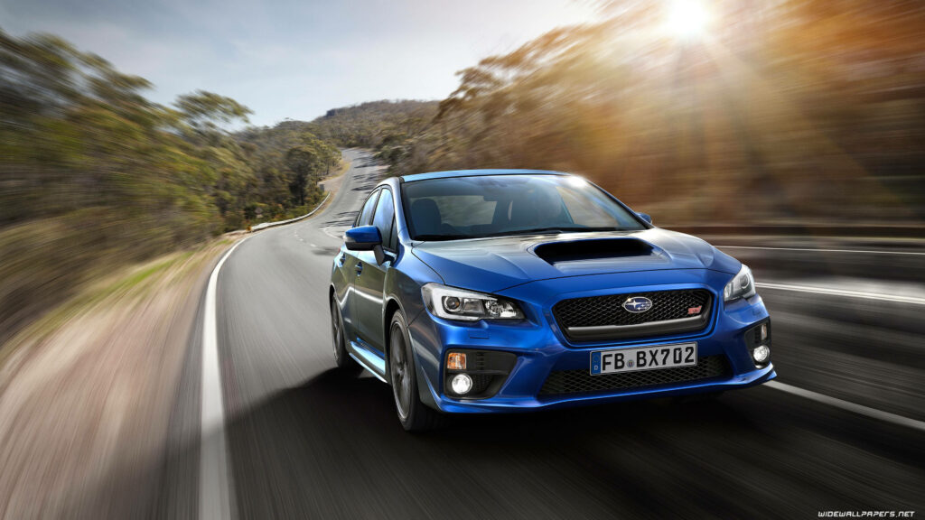 Vibrant Subaru Impreza Wallpaper: Speeding Through Scenic Beauty