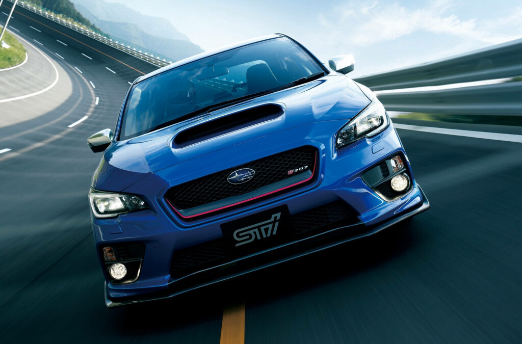 Dynamic Subaru WRX STI 4K Wallpaper: Thrilling Race Track Action
