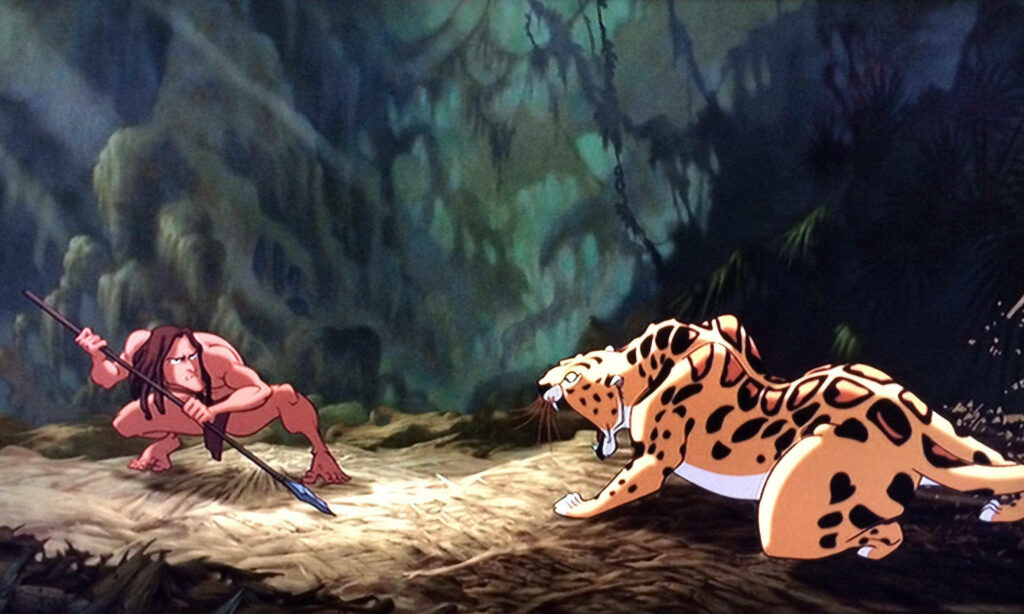 Vibrant Tarzan Wallpaper: Epic Jungle Showdown with a Jaguar