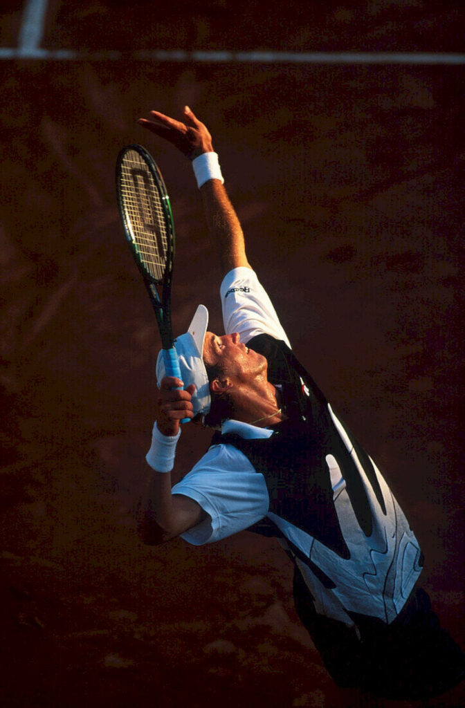 Dynamic Tennis Wallpaper: Patrick Rafter's Powerful Serve Action