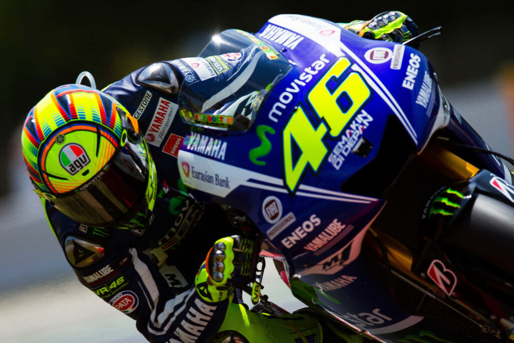 Dynamic VR46 Yamaha Movistar Motorcycle Wallpaper - High-Speed Racing